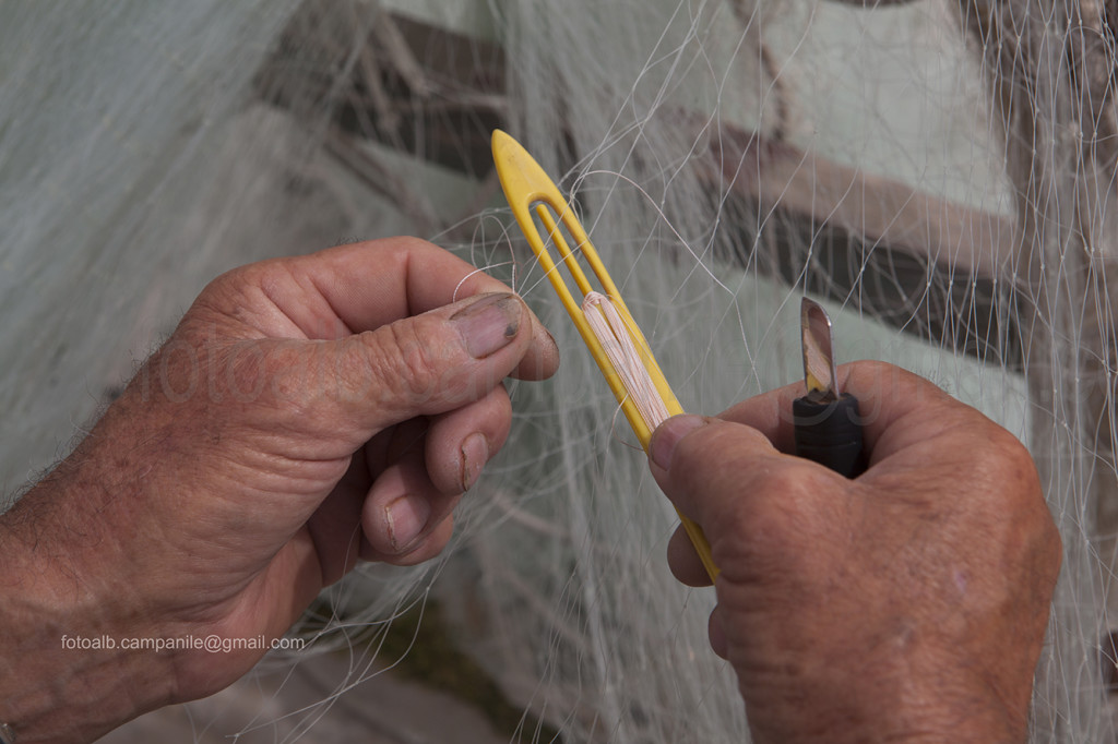 Fisherman and fishing net, Fasana, Fažana, Istria, Croatia